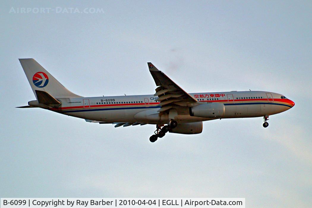 B-6099, 2008 Airbus A330-243 C/N 916, Airbus A330-243 [916] (China Eastern Airlines) Home~G 04/04/2010. On approach 27L as the sun was setting.