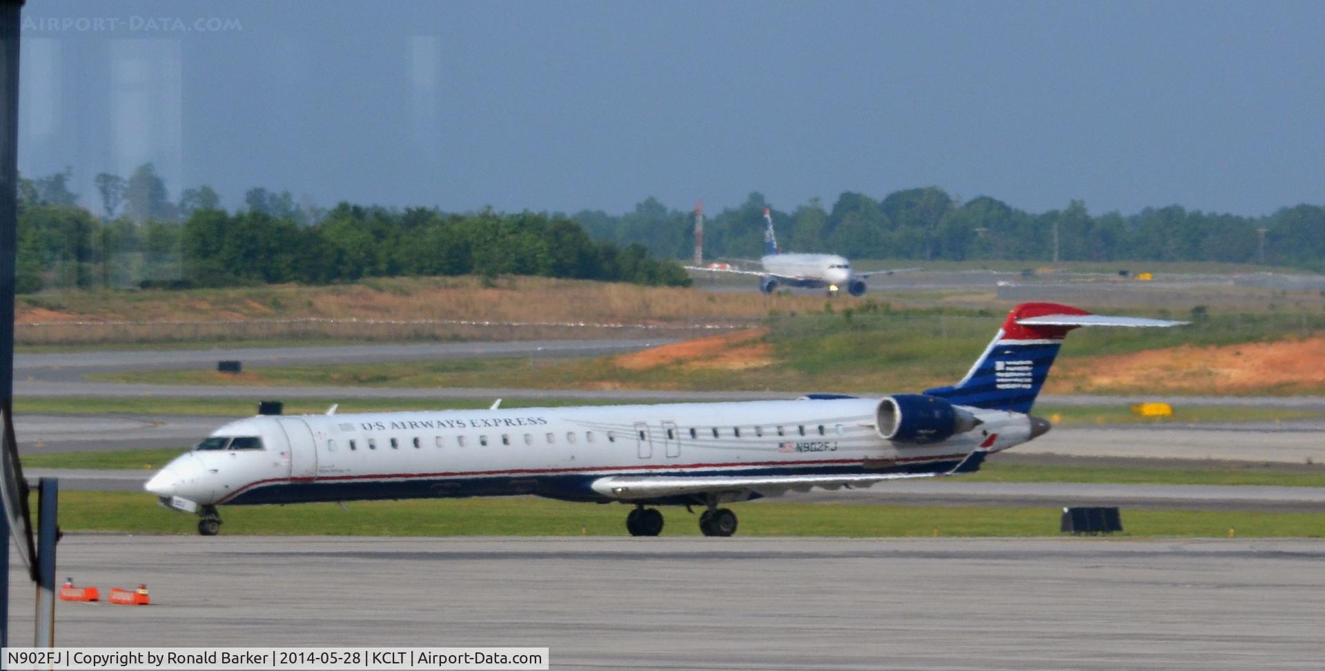 N902FJ, 2003 Bombardier CRJ-900ER (CL-600-2D24) C/N 15002, Taxi CLT