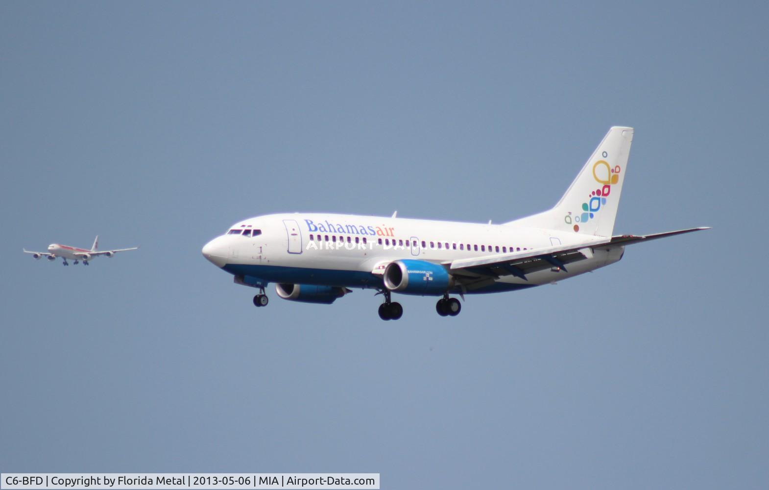 C6-BFD, 1993 Boeing 737-5H6 C/N 26448, Bahamas Air 737-500 with Iberia A340-600 landing on another runway