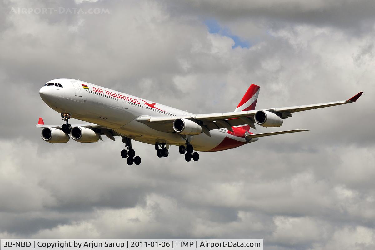 3B-NBD, 1997 Airbus A340-313 C/N 194, 'Parakeet' approaching rwy 14 at Plaisance under cloudy skies.
