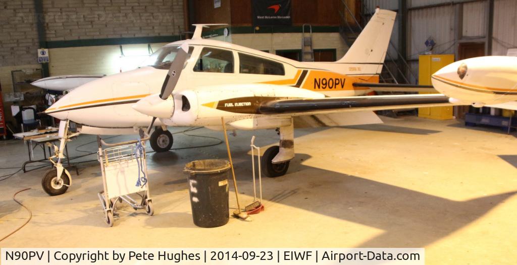 N90PV, 1968 Cessna 310N C/N 310N-0054, N90PV Cessna 310N receiving attention at Waterford