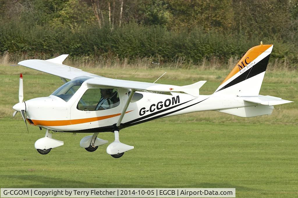 G-CGOM, 2010 Flight Design MC C/N A-10-04-31, 2010 Flight Design MC, c/n: A-10-04-31 doing circuits at City of Manchester