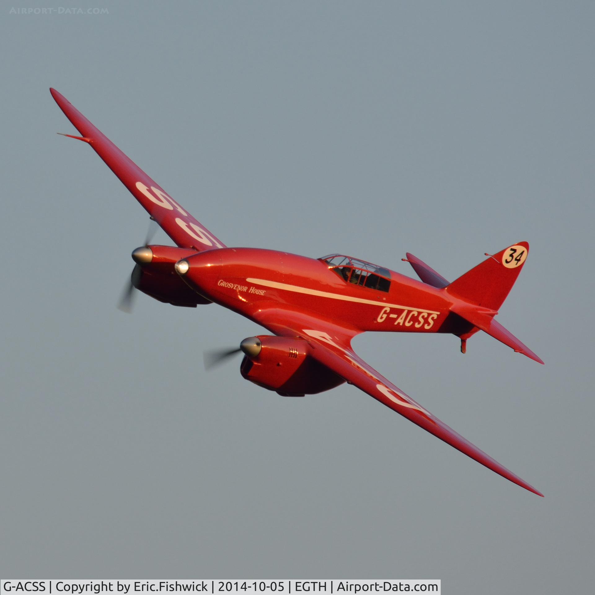 G-ACSS, 1934 De Havilland DH-88 Comet C/N 1996, 43. G-ACSS in display mode at the rousing season finale Race Day Air Show at Shuttleworth, Oct. 2014.