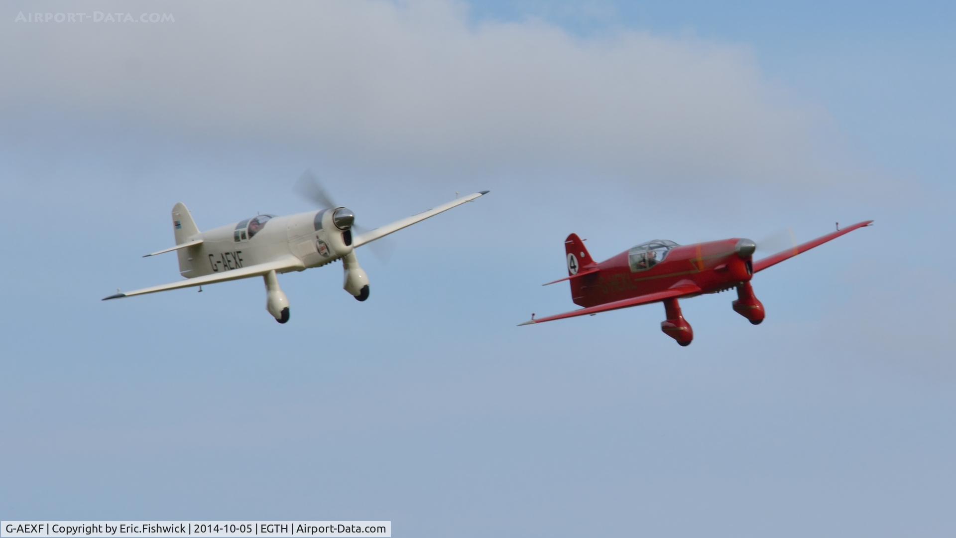 G-AEXF, 1936 Percival E-2H Mew Gull C/N E22, 45. Outstanding skill required: Two Mew Gulls sharing the airspace - in display mode at the rousing season finale Race Day Air Show at Shuttleworth, Oct. 2014.