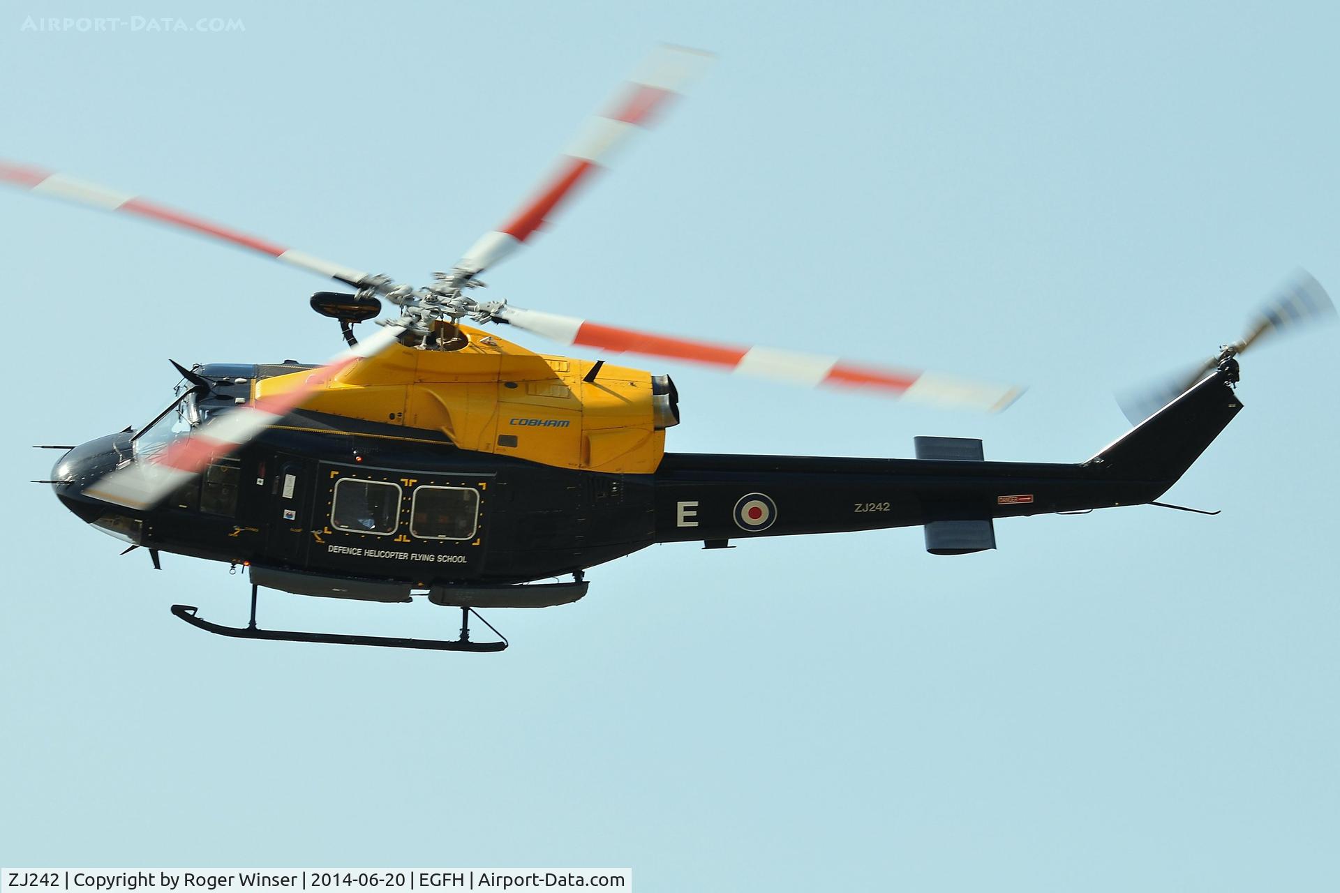 ZJ242, 1994 Bell 412EP Griffin HT1 C/N 36095, Fast and low pass by a Griffin helicopter coded E of 60(R) Squadron RAF.