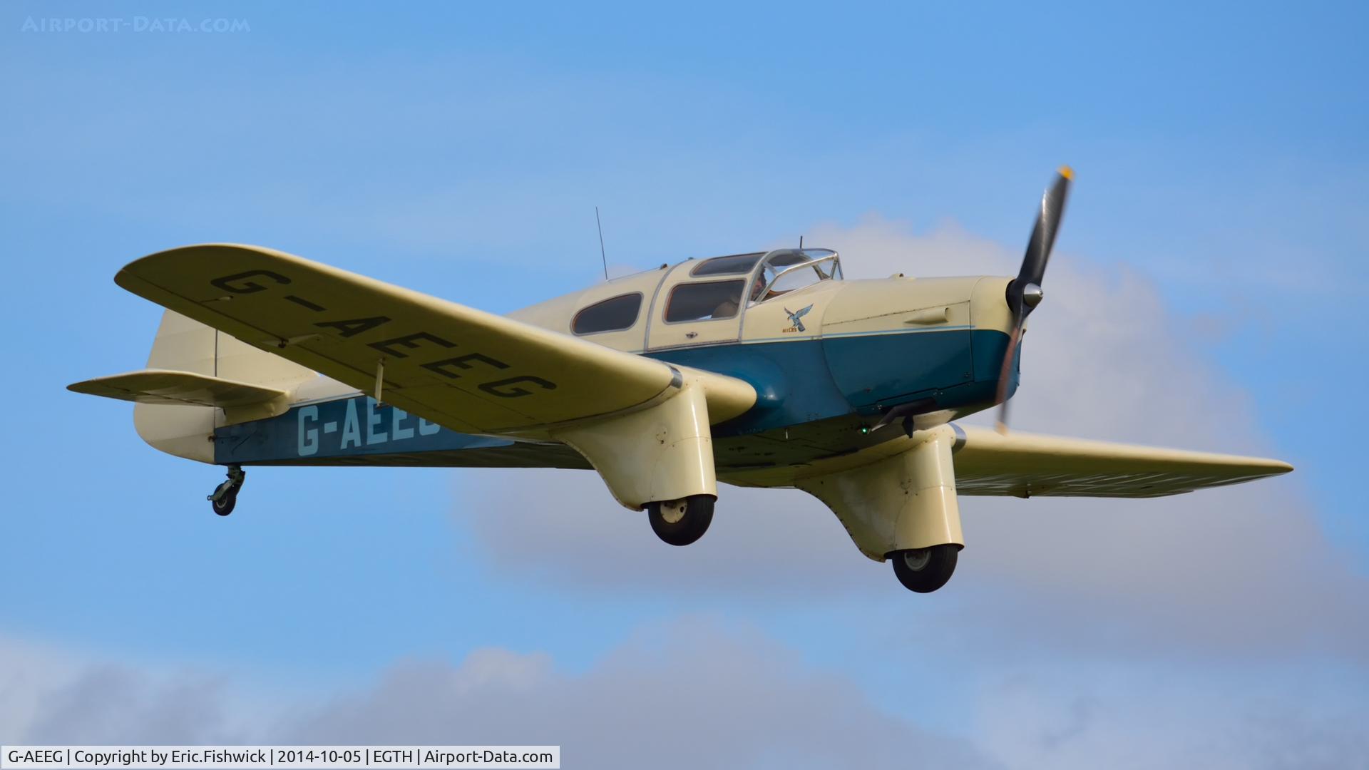 G-AEEG, 1936 Miles M-3A Falcon Major C/N 216, 43. G-AEEG in display mode at the rousing season finale Race Day Air Show at Shuttleworth, Oct. 2014.