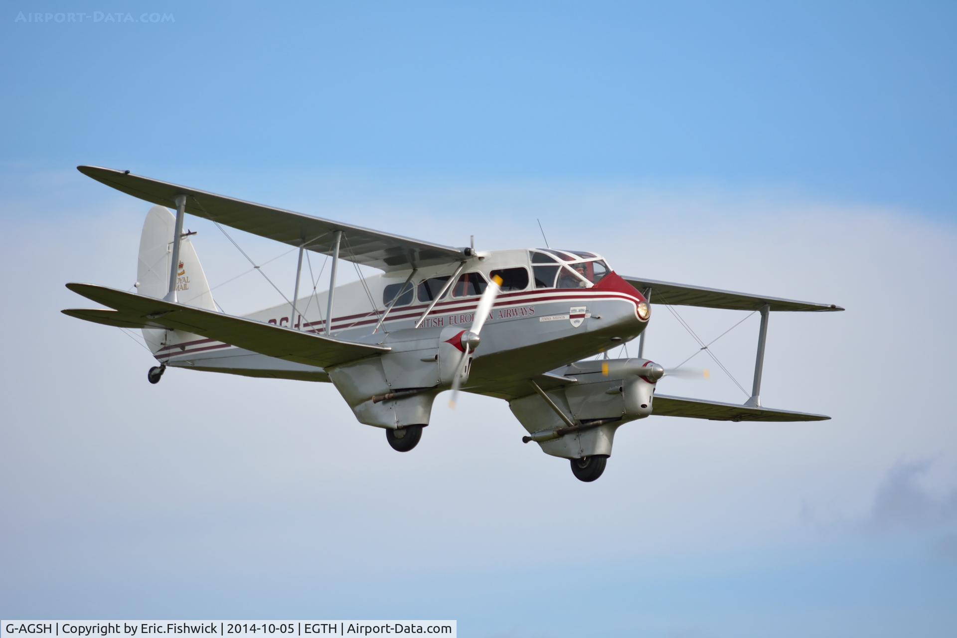 G-AGSH, 1945 De Havilland DH-89A Dominie/Dragon Rapide C/N 6884, 43. G-AGSH in display mode at the rousing season finale Race Day Air Show at Shuttleworth, Oct. 2014.