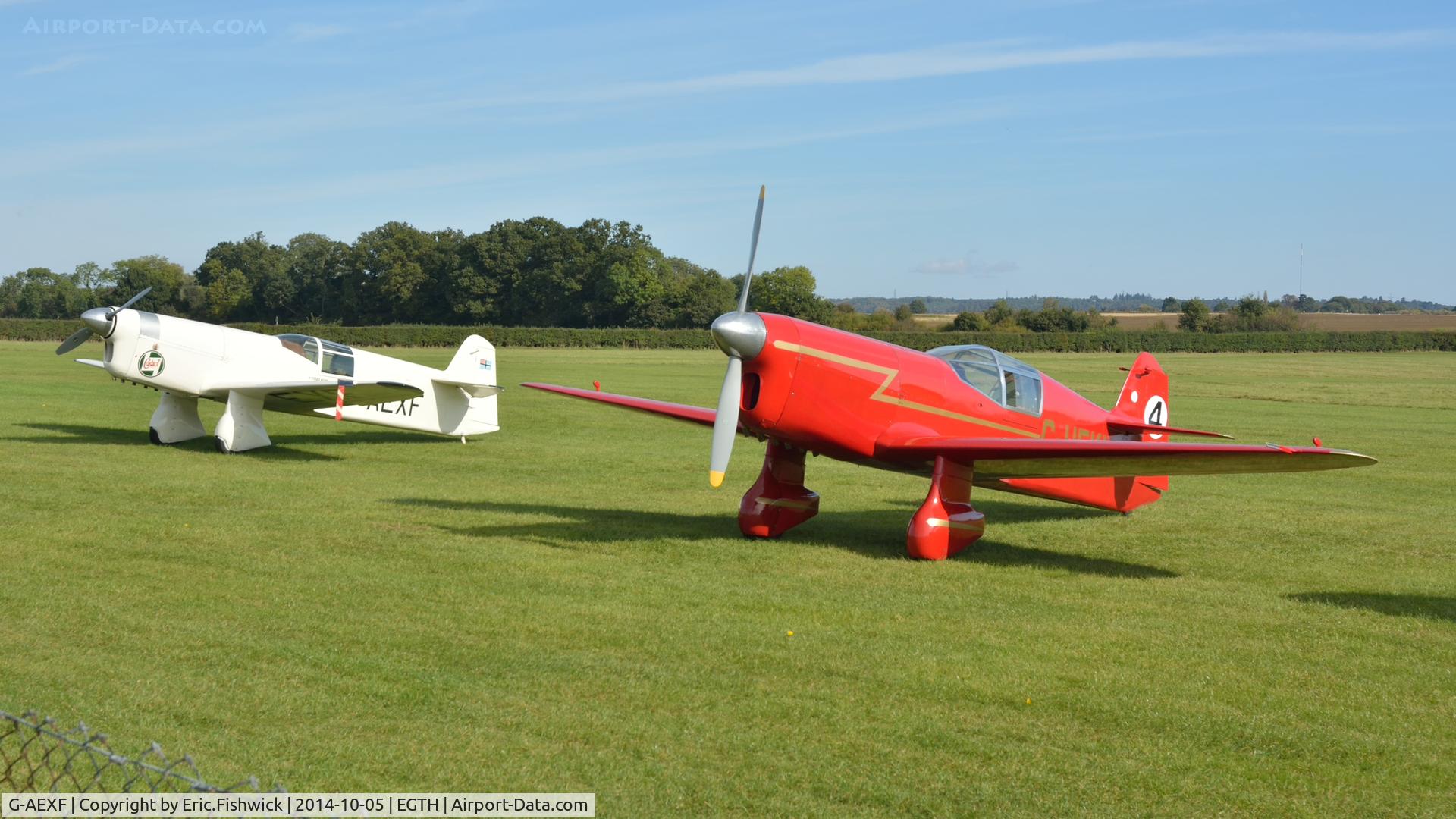 G-AEXF, 1936 Percival E-2H Mew Gull C/N E22, 5. G-AWXF with G-HEKL at the rousing season finale Race Day Air Show at Shuttleworth, Oct. 2014.