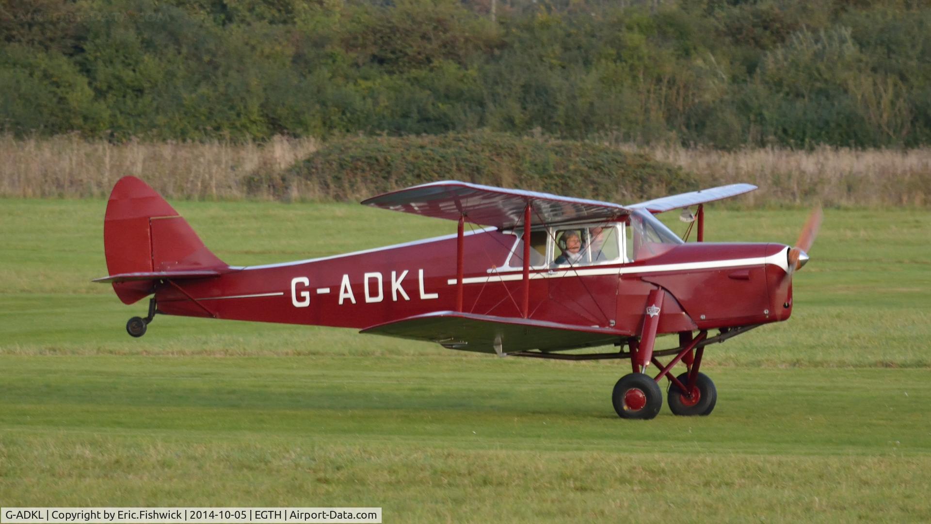 G-ADKL, 1935 De Havilland DH.87B Hornet Moth C/N 8035, 2. G-ADKL departing the rousing season finale Race Day Air Show at Shuttleworth, Oct. 2014