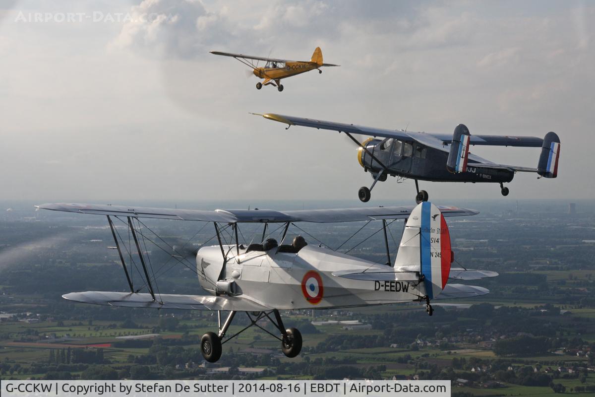 G-CCKW, 1954 Piper L-21B Super Cub (PA-18-135) C/N 18-3535, Returning home from Schaffen Oldtimer Fly-in in close formation with G-CCKW (Piper PA-18-150 Super Cub), F-BNEX (Max Holste MH-1521 Broussard) and D-EEDW (Stampe-Vertongen SV-4C). Picture taken from G-NETY (Piper PA-18-150 Super Cub).