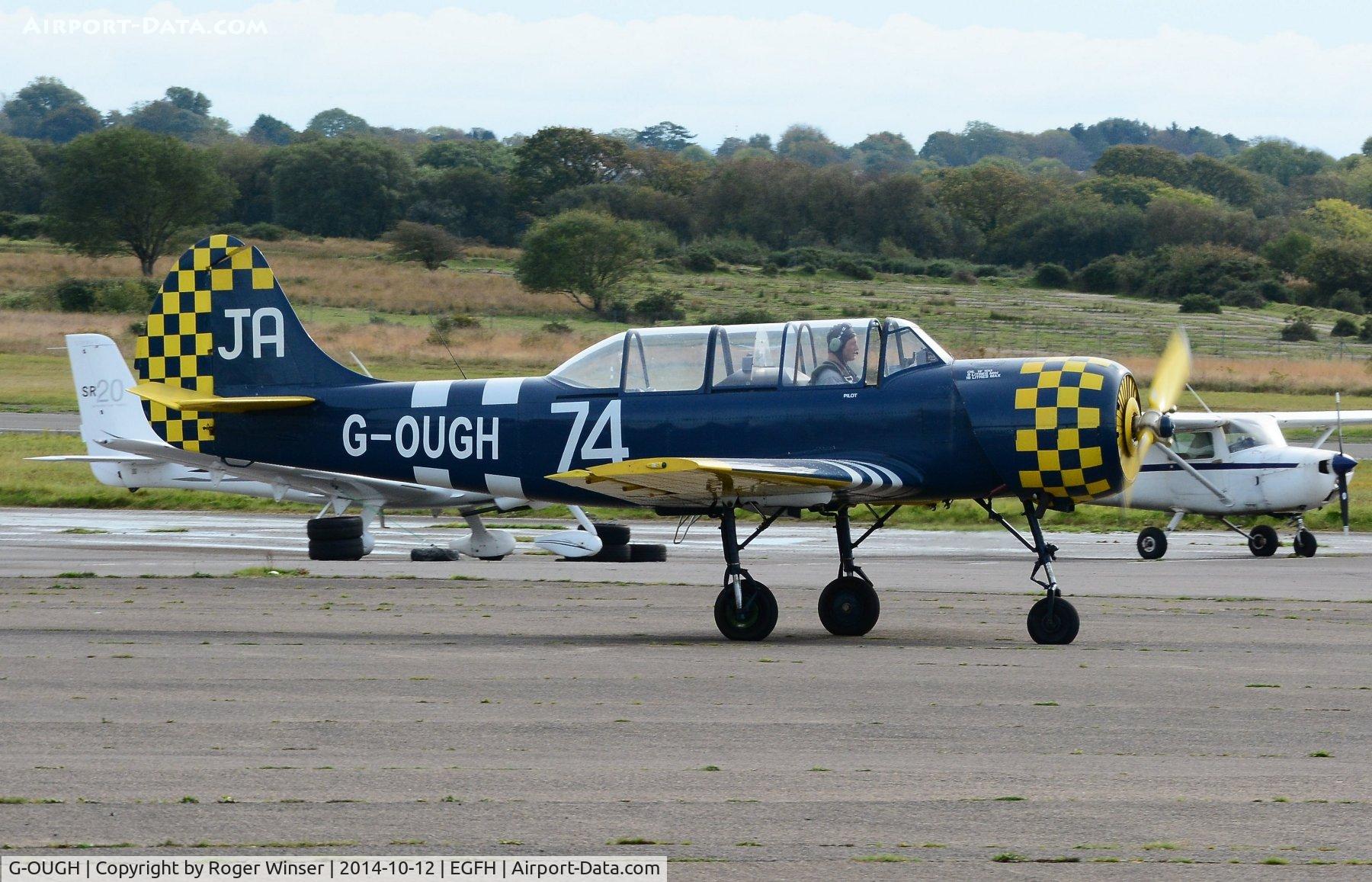 G-OUGH, 1987 Bacau Yak-52 C/N 877404, Resident Yak-52. Marked 62/IV on port side fuselage/fin.