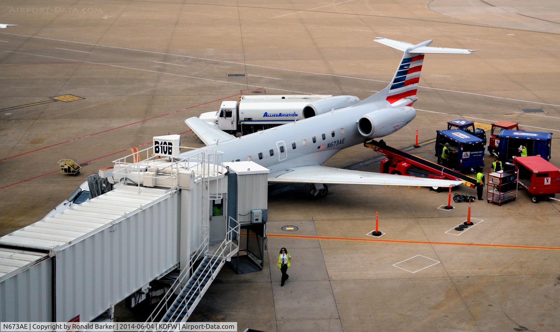 N673AE, 2004 Embraer ERJ-145LR (EMB-145LR) C/N 145797, Gate B10B DFW