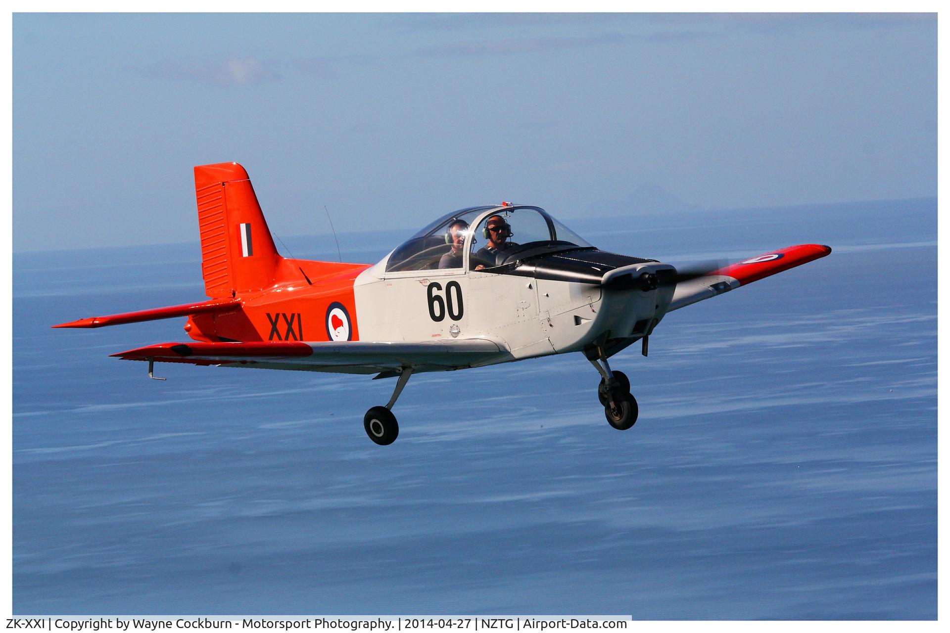 ZK-XXI, 1964 AESL Airtourer T3A C/N C60, This photo was taken in April 2014 over Mount Maunganui as a surprise birthday present for one of the co-owners Craig Saunders - sitting in the right seat.  The photo was taken from the Stearman ZK-XAF of Classic Flyers.