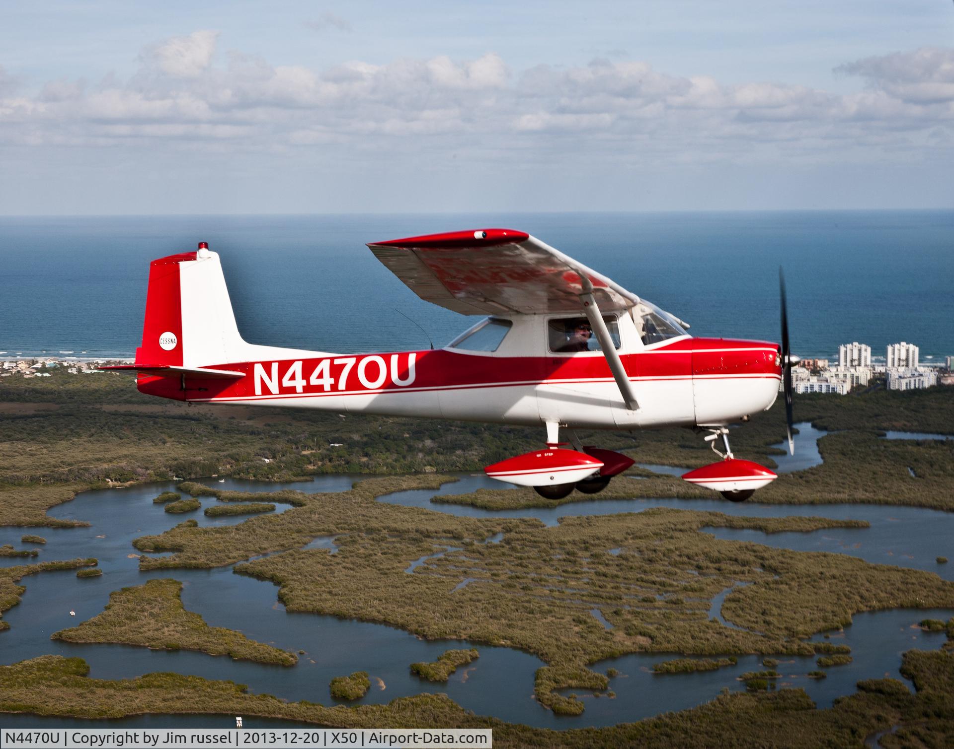 N4470U, 1964 Cessna 150D C/N 15060470, Over the Edgewater in land water way