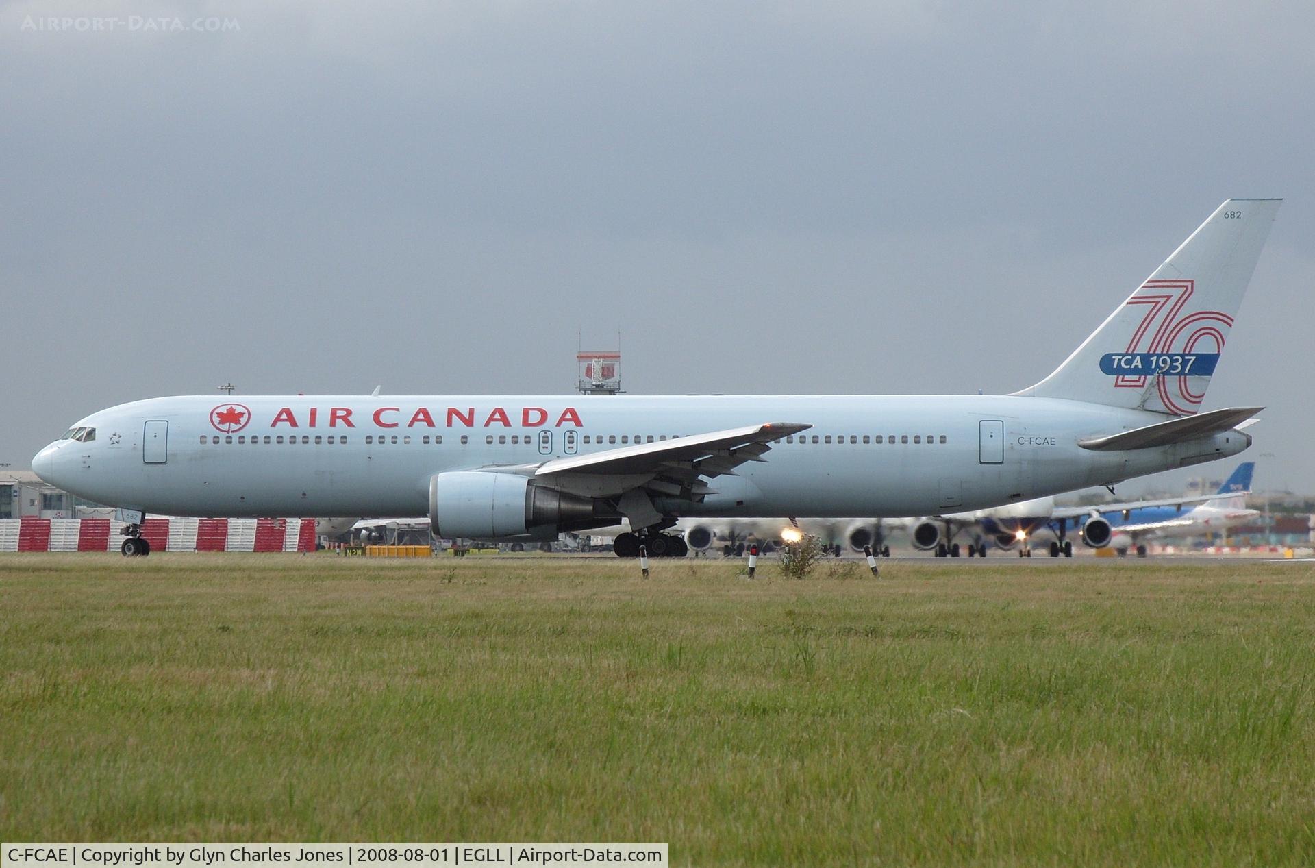C-FCAE, 1988 Boeing 767-375/ER C/N 24083, Lining up for take off on runway 27L. 70 years since the formation of T.C.A. Trans Canada Airlines on tail. (Forerunner of Air Canada). Formerly with Canadian Airlines. Test registration was N6046P. Fleet number '682'.