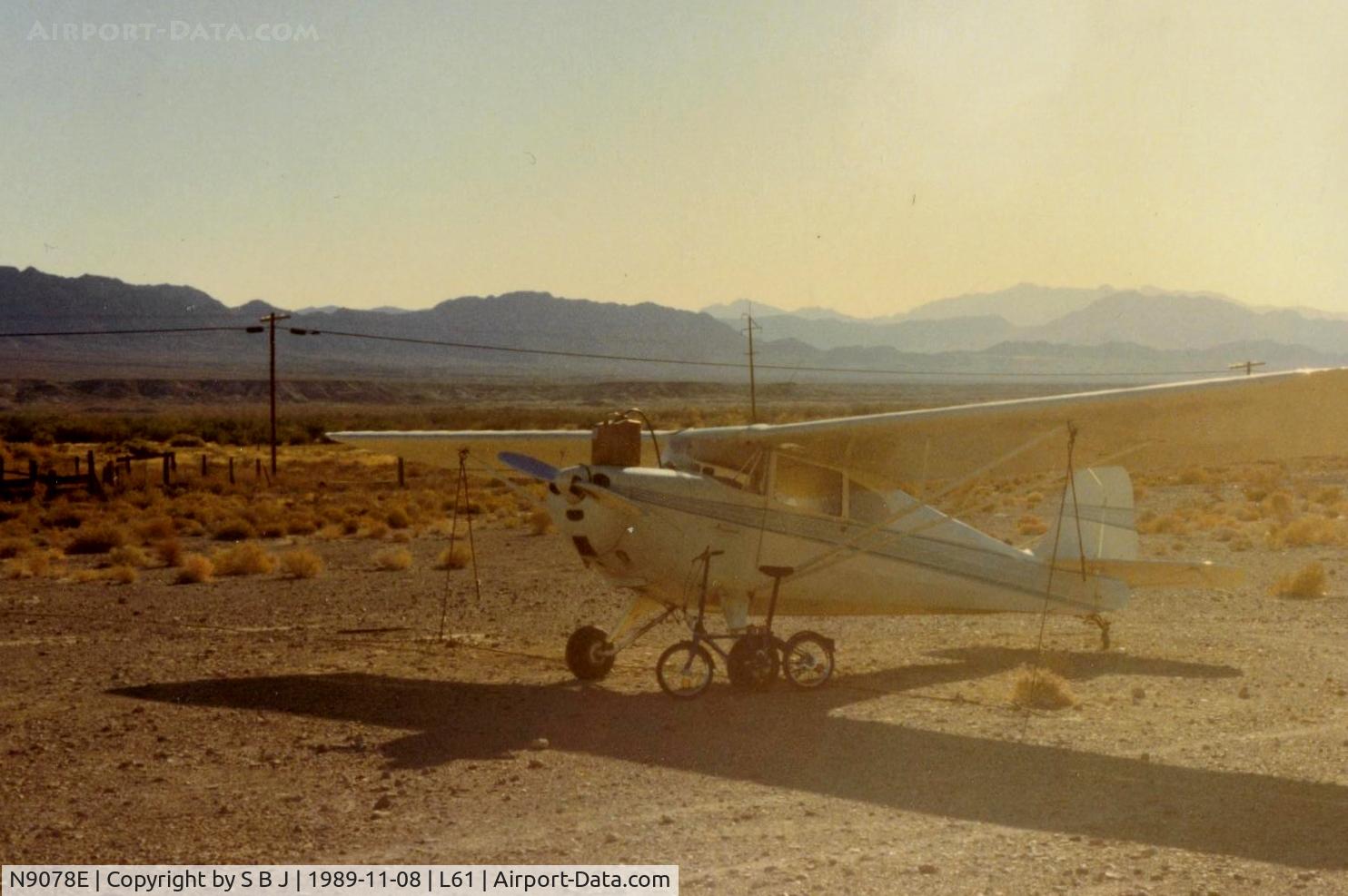 N9078E, 1946 Aeronca 11AC Chief C/N 11AC-710, 78E being fueled.The usual procedure in the desert was a bike, gas can and a hose.