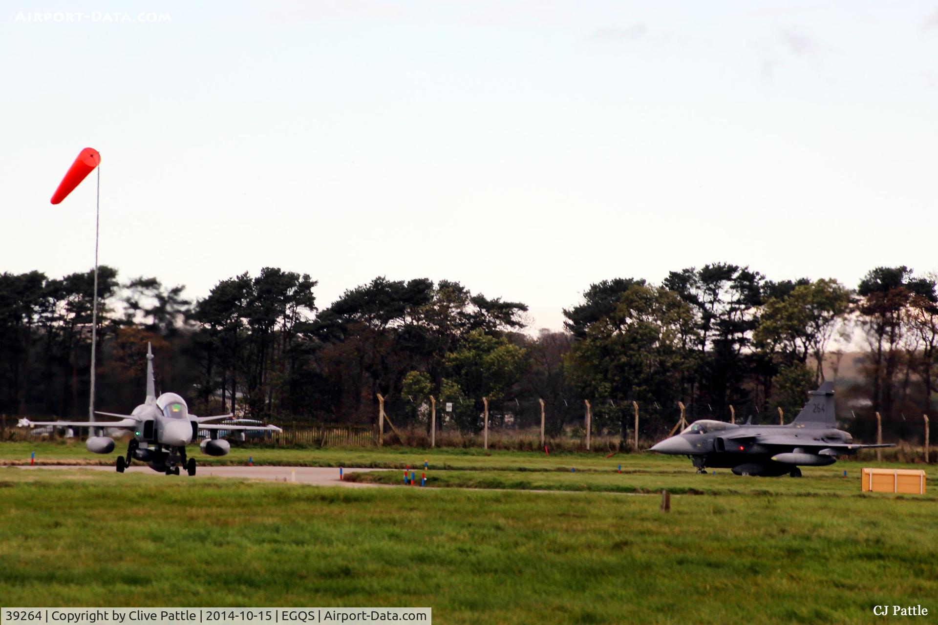 39264, Saab JAS-39C Gripen C/N 39264, Seen (on left) holding at runway 05 at RAF Lossiemouth whilst participating in Exercise Joint Warrior 14-2