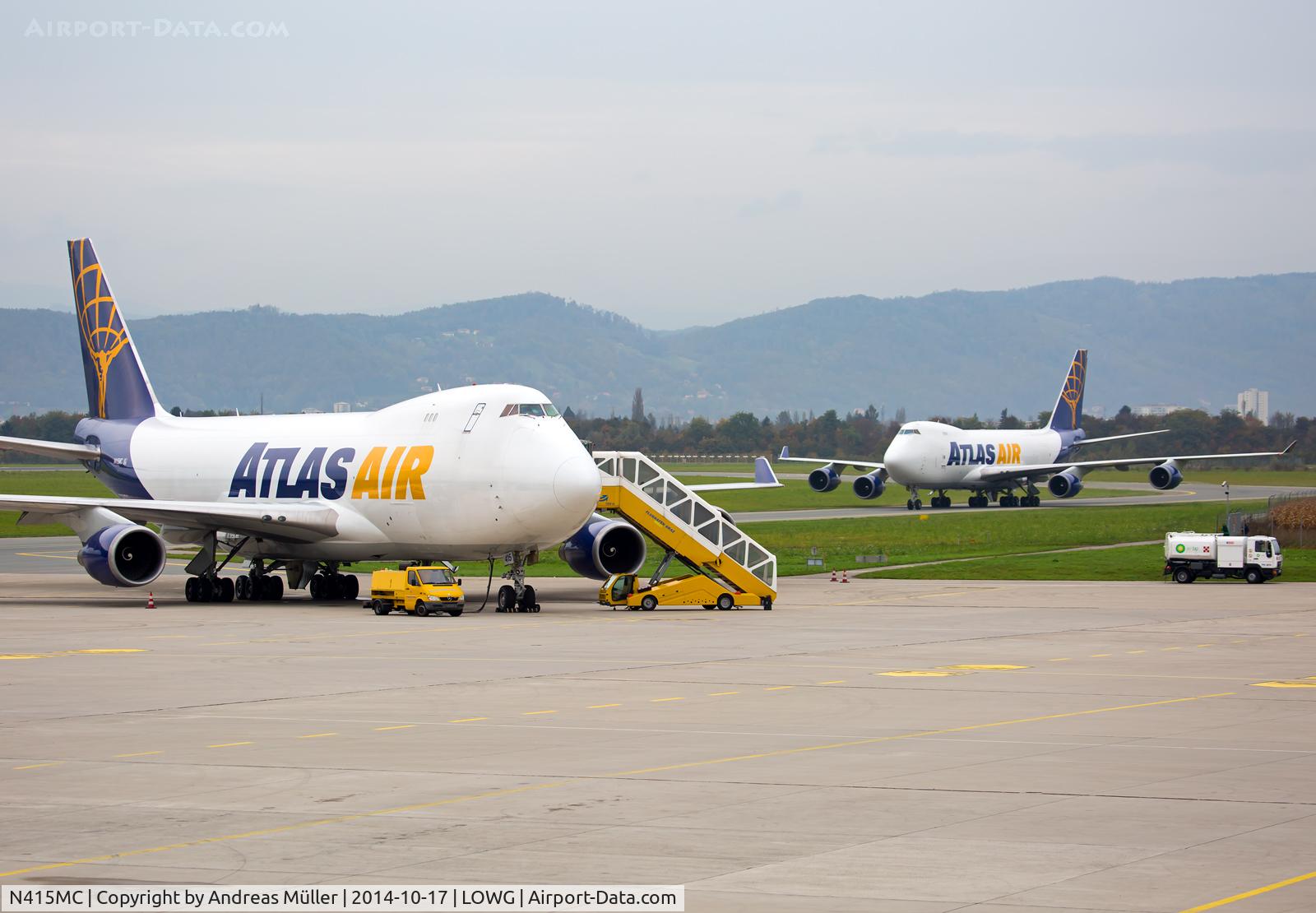 N415MC, 2002 Boeing 747-47UF C/N 32837, Two Boeing 747 @ LOWG.