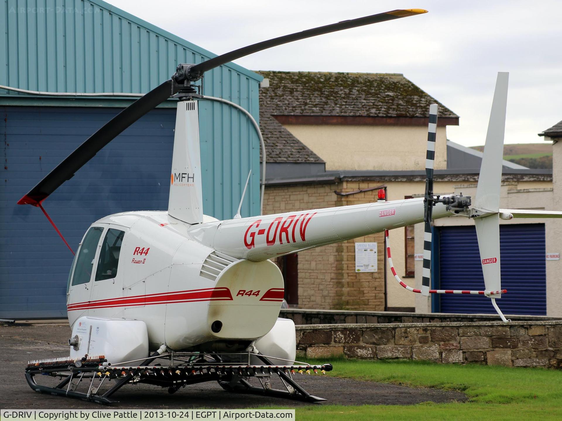 G-DRIV, 2003 Robinson R44 Raven II C/N 10126, Parked up at Perth EGPT