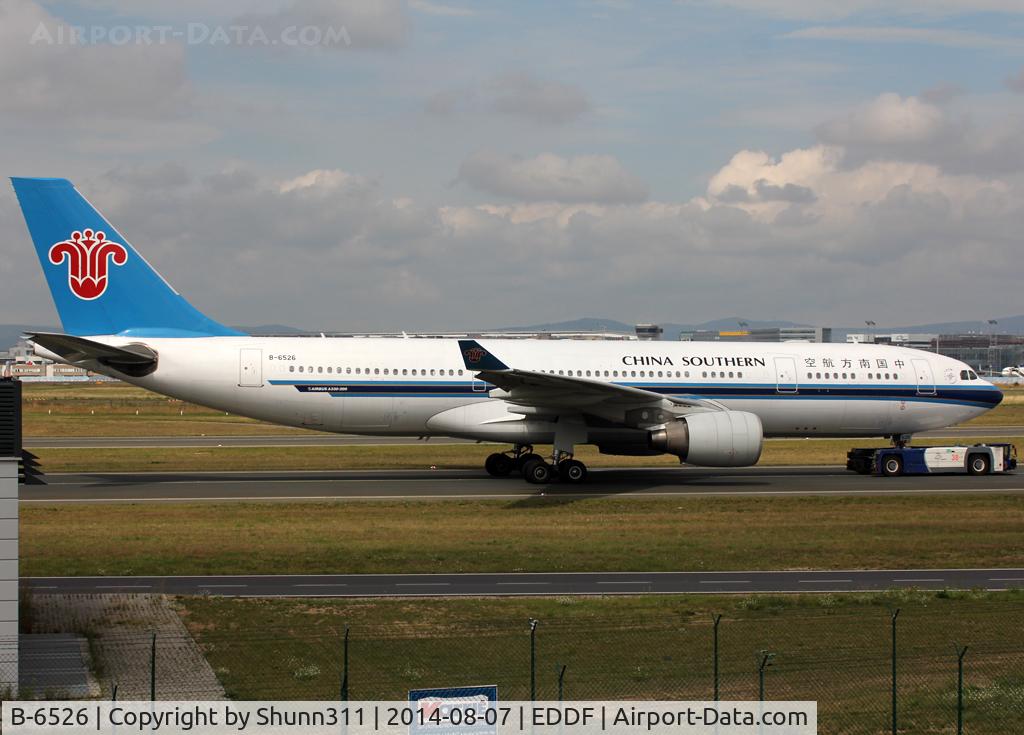B-6526, 2011 Airbus A330-223 C/N 1220, Trackted to his gate...