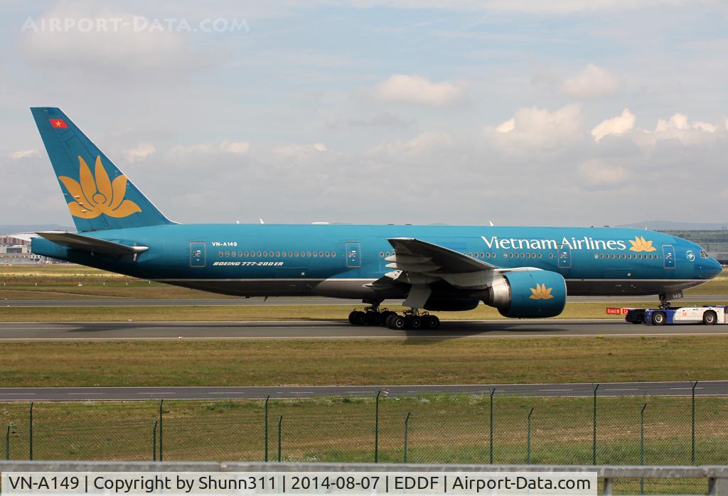 VN-A149, 2005 Boeing 777-2Q8/ER C/N 32716, Trackted to his gate...