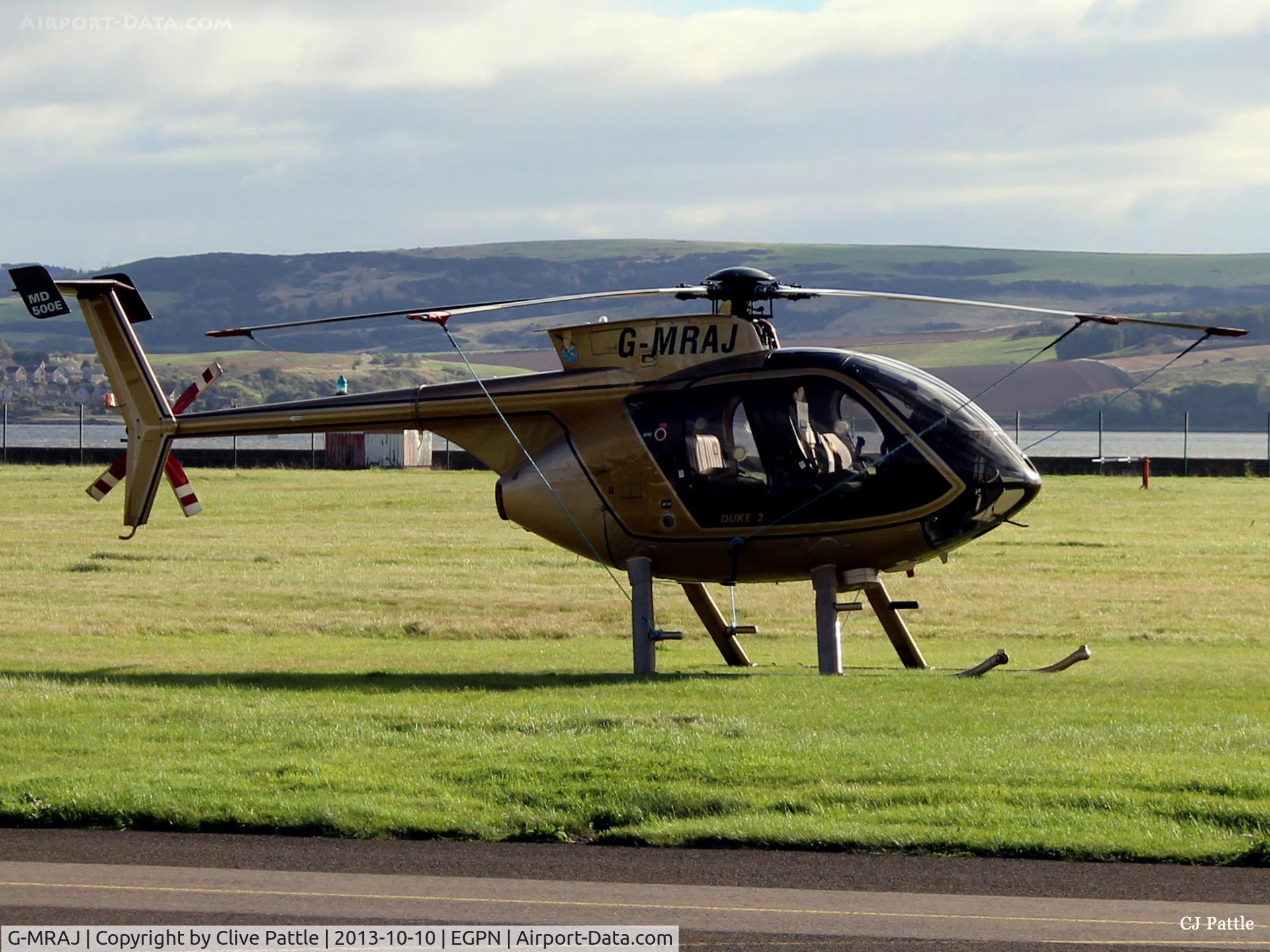 G-MRAJ, 1983 Hughes 369E C/N 0010E, Out to grass at Dundee Riverside EGPN