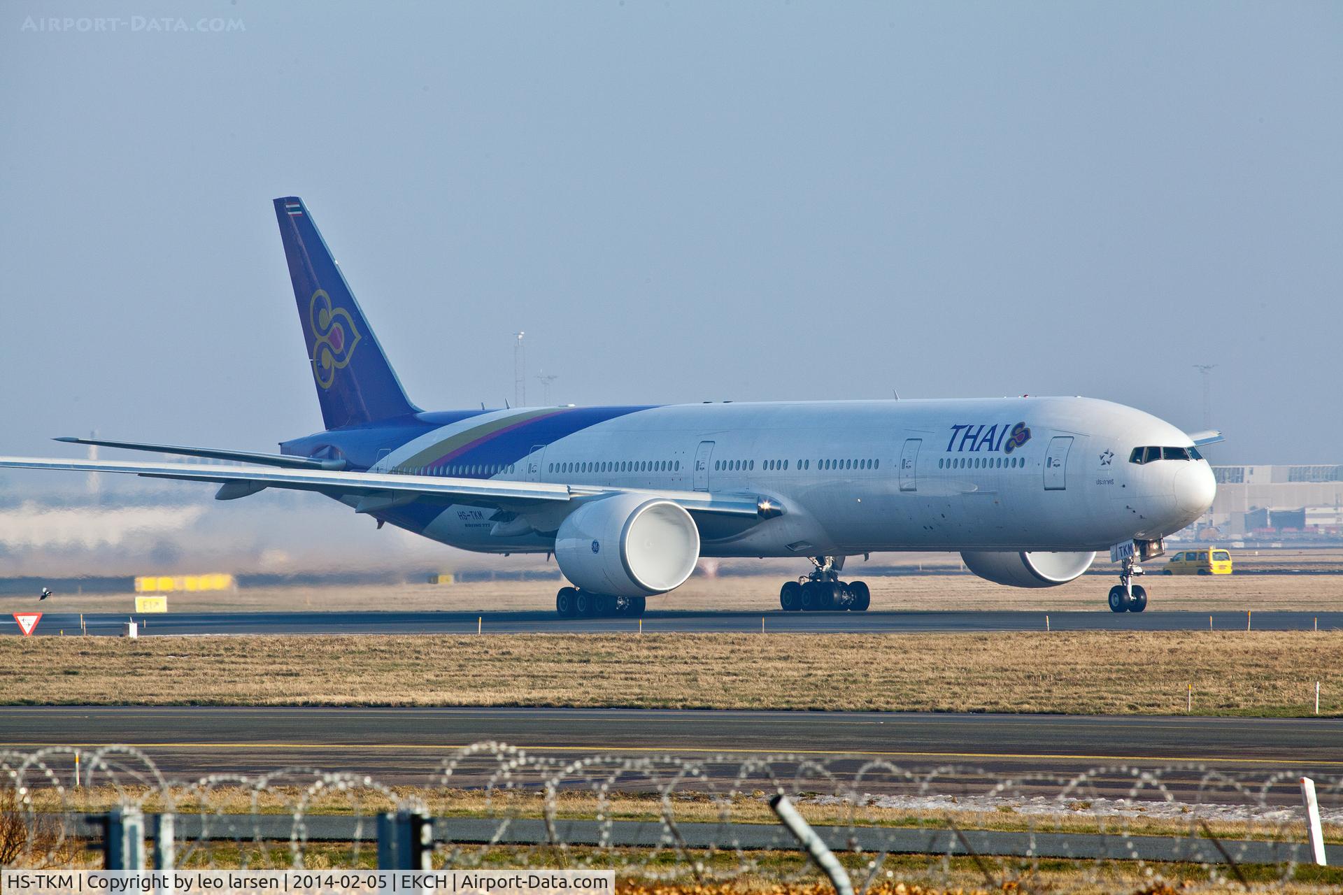 HS-TKM, 2013 Boeing 777-3AL/ER C/N 41522, Copenhagen 5.2.14 .
obs the white condens in 
engine inlet