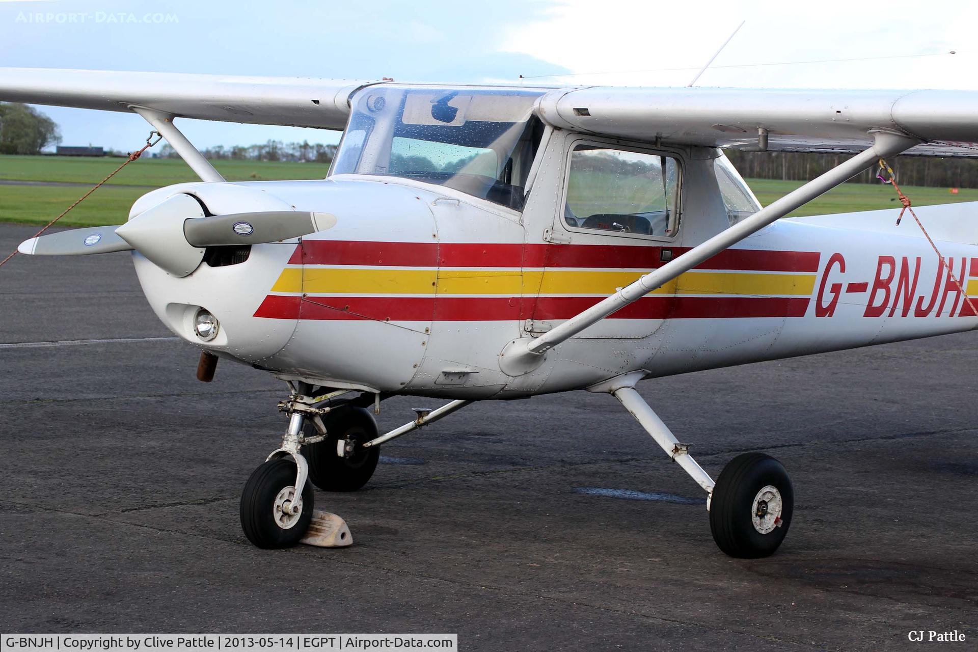 G-BNJH, 1982 Cessna 152 C/N 152-85401, Parked up at dusk at Perth EGPT