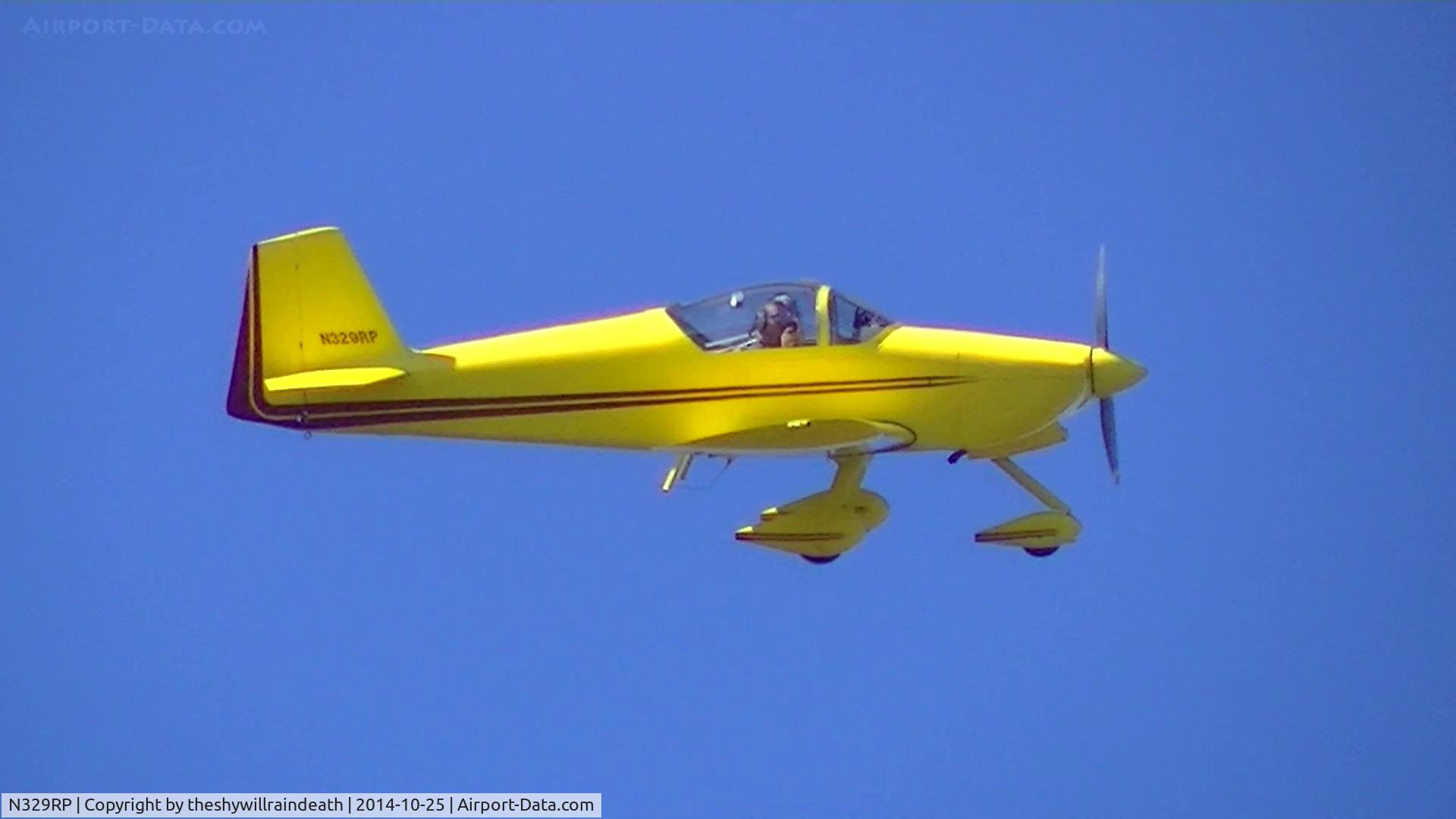 N329RP, 2002 Vans RV-6A C/N 24828, Vans RV-6A performing a fly- by at a casual event.