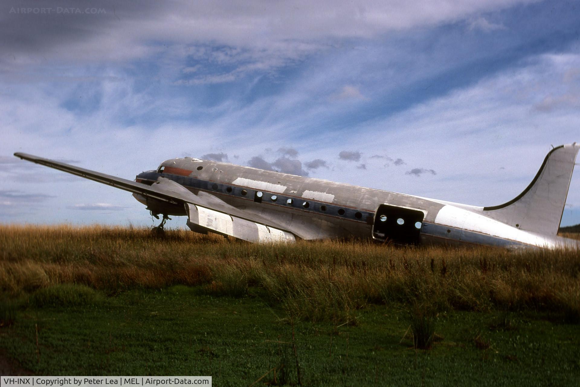 VH-INX, 1944 Douglas C-54B Skymaster (DC-4) C/N 18327, Ex Ansett Airlines of Australia Douglas Dc4 VH-INX derelict at Melton in Victoria. Photo taken in mid 1970's