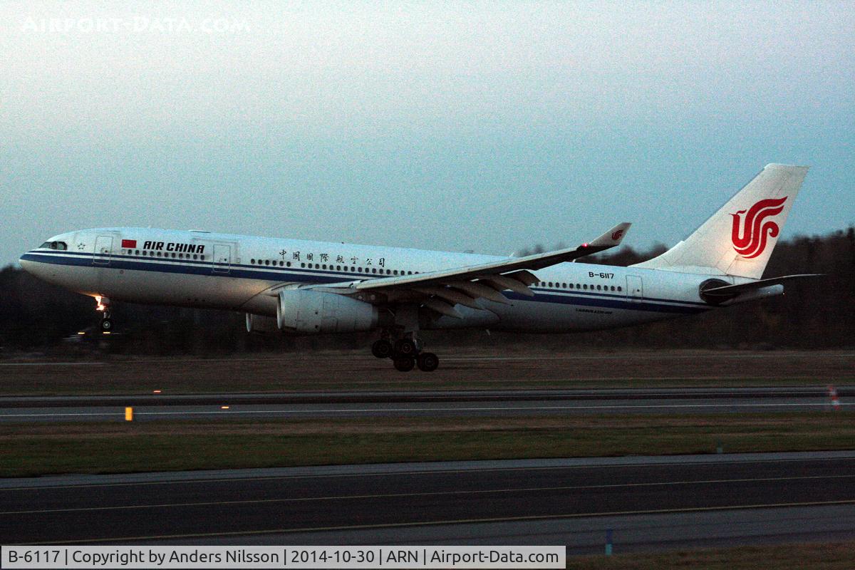 B-6117, 2008 Airbus A330-243 C/N 0903, On very short final for runway 26.