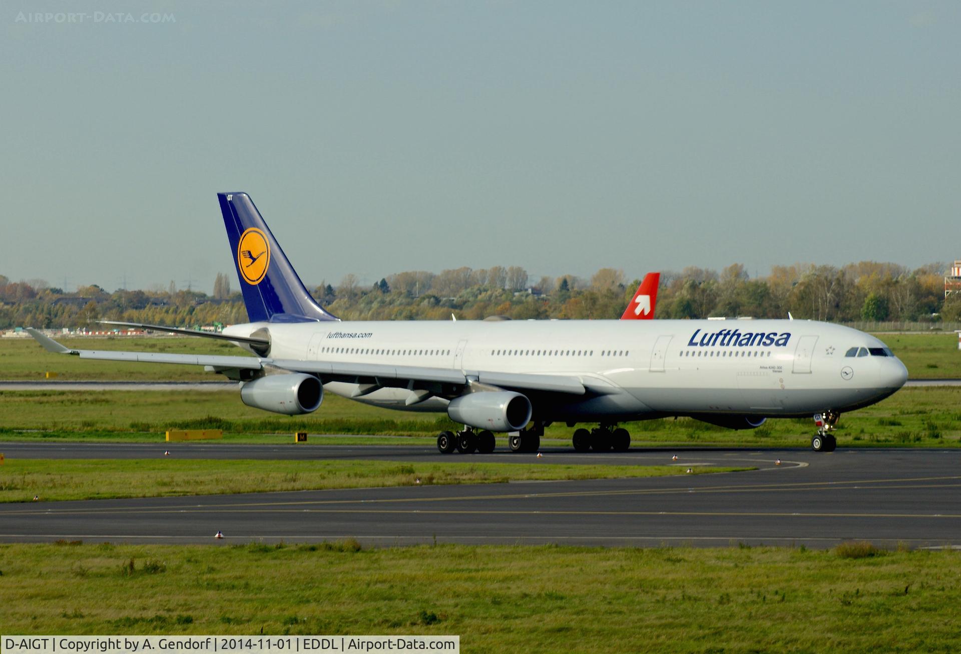 D-AIGT, 1999 Airbus A340-313 C/N 304, Lufthansa, is here at Düsseldorf Int'l(EDDL), taxiing to RWY 23L