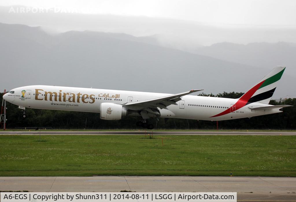 A6-EGS, 2012 Boeing 777-31H/ER C/N 41078, Landing rwy 23 with additional Wolrd Cup 2014 logo on cockpit...