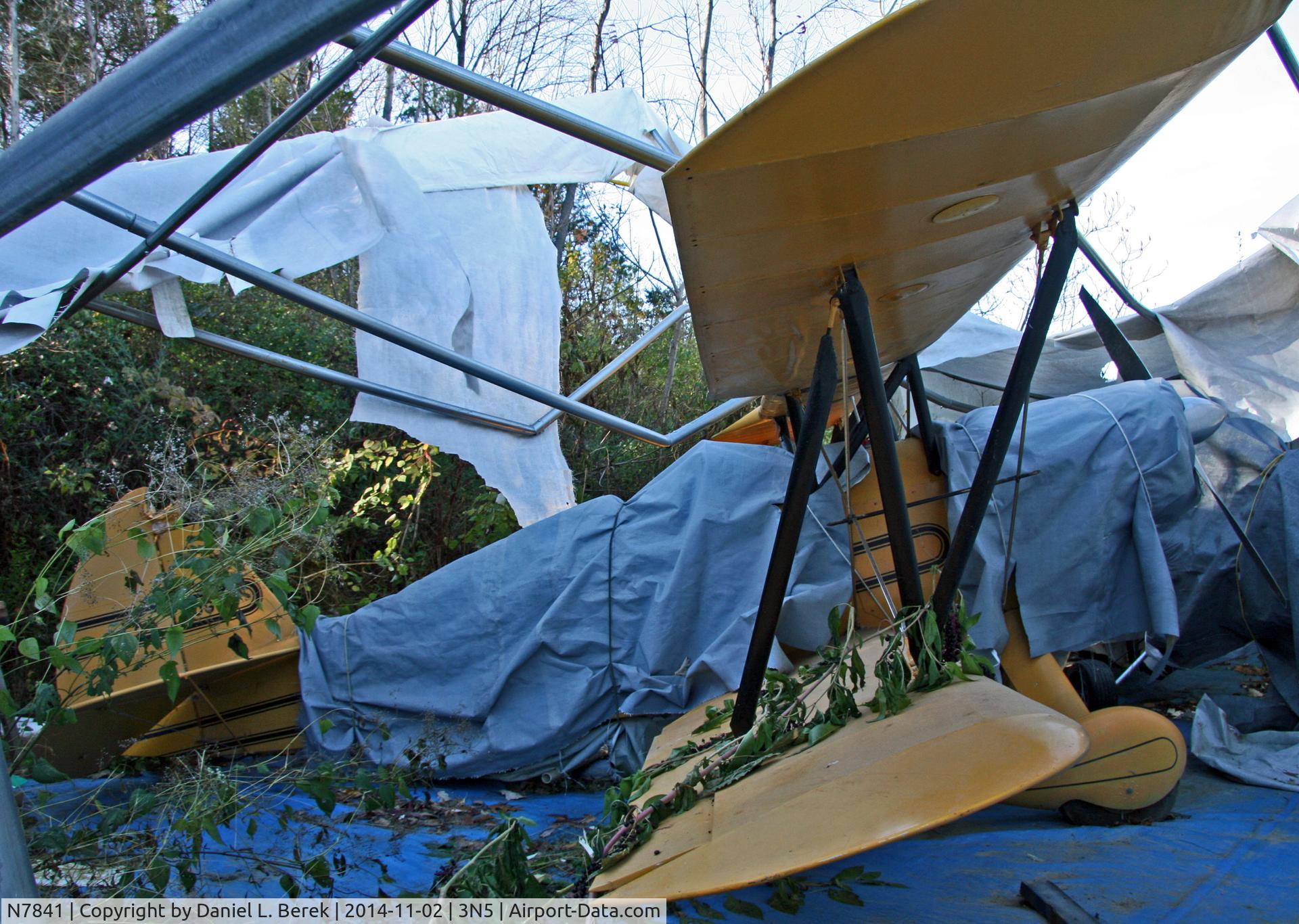 N7841, 1967 EAA Biplane C/N RK-1, This poor biplane sits in an abandoned hangar at Newton Airport, with no way out.