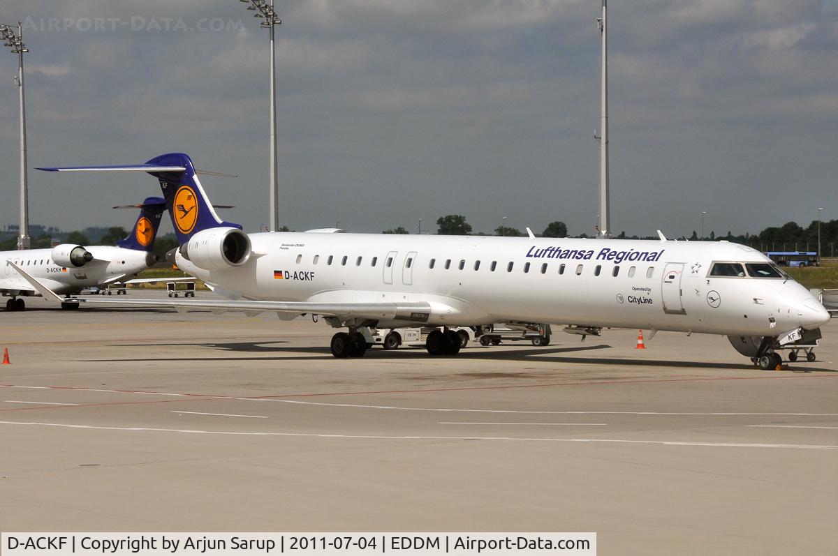 D-ACKF, 2006 Bombardier CRJ-900LR (CL-600-2D24) C/N 15083, 'Prenzlau' on the tarmac at MUC in front of 'Radebeul'.