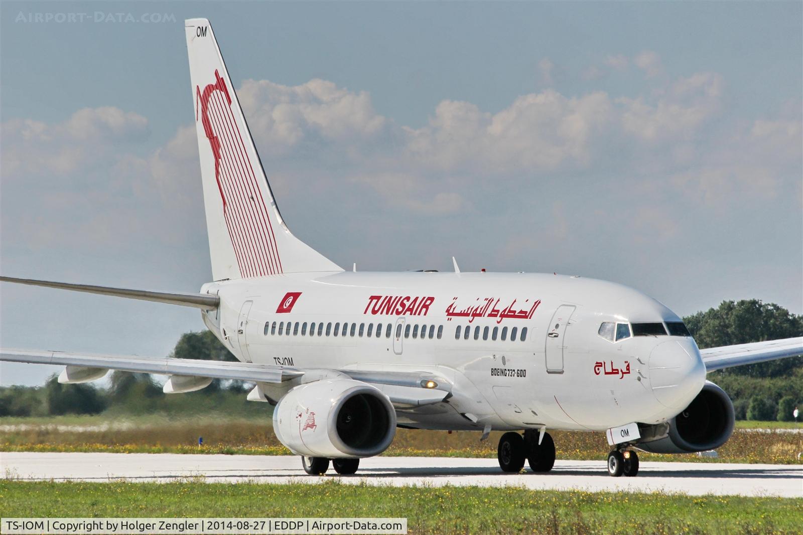 TS-IOM, 1999 Boeing 737-6H3 C/N 29498, On taxi to holding point 26R, expecting departure to NBE...