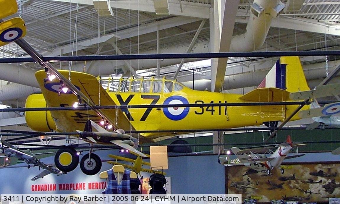 3411, North American NA-64 Yale C/N 64-2167, North American NA-64 Yale Mk.1 [64-2167] (Canadian Warplane Heritage) Hamilton~C 24/06/2005. Displayed in the bookshop resulting in this image. Unable to get a better shot as the thick bars are placed throughout to hang models and other display ite