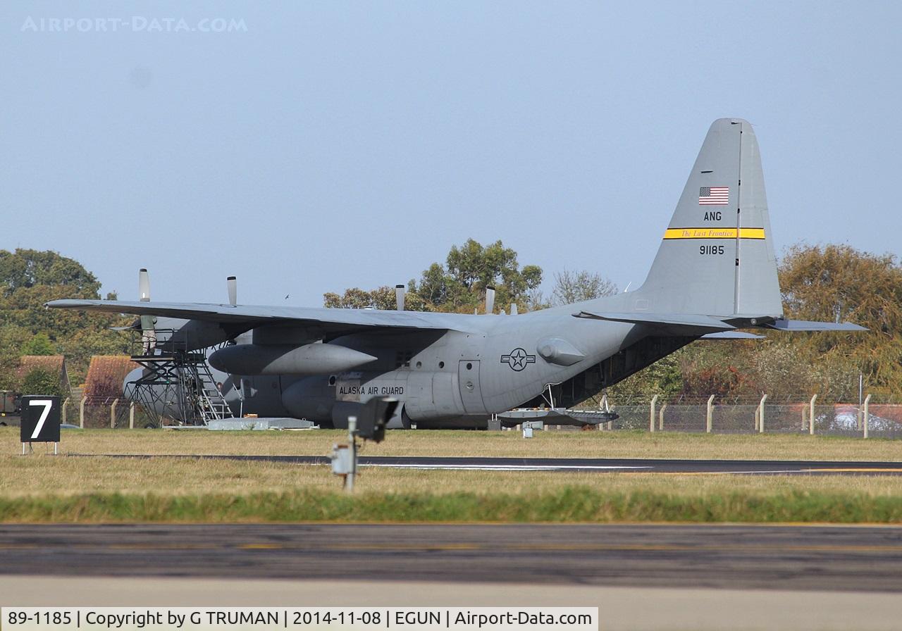 89-1185, Lockheed EC-130H Hercules C/N 382-5194, A long way from home, undergoing attention to the port outboard engine.