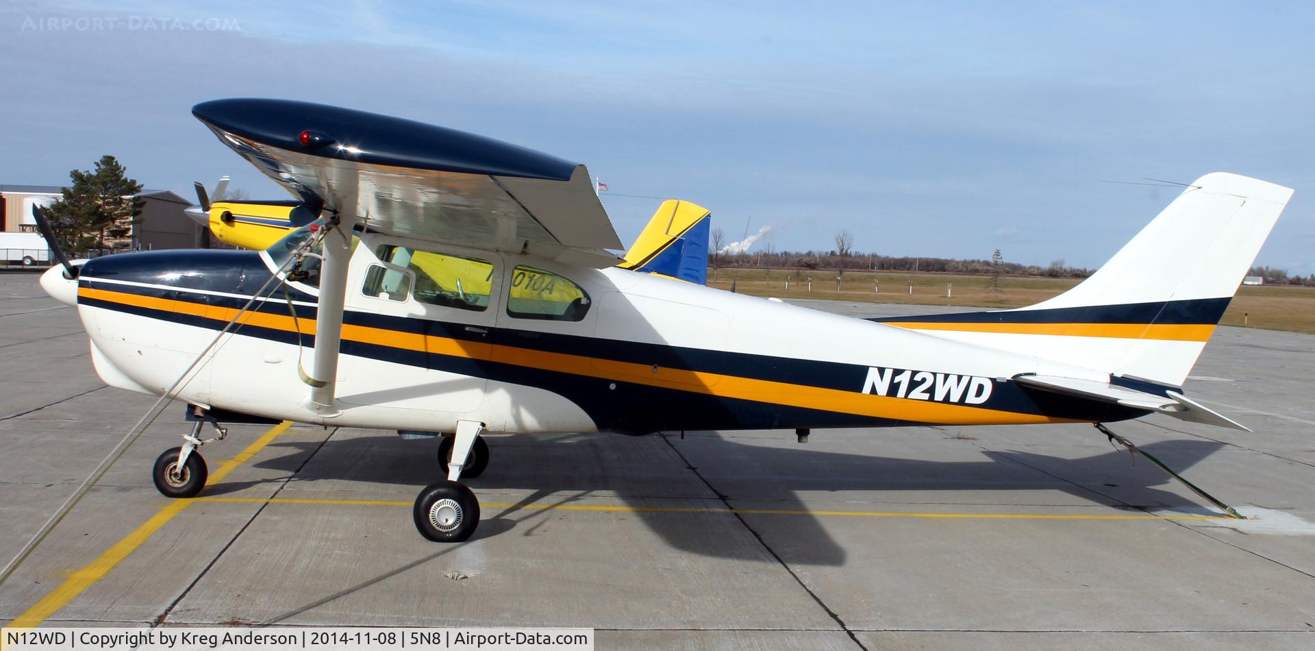 N12WD, 1960 Cessna 210 C/N 57480, Cessna 210 Centurion on the ramp in Casselton, ND.
