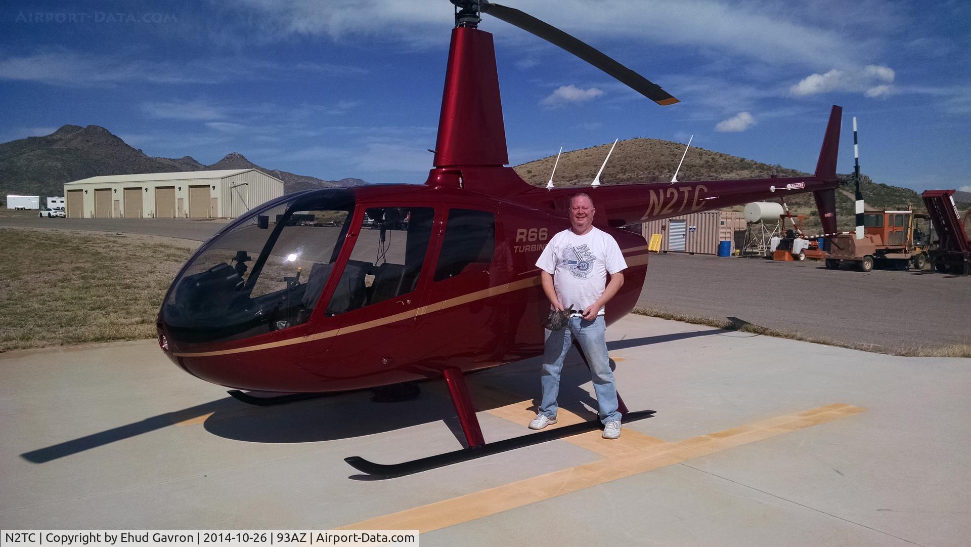 N2TC, Robinson R66 C/N 0009, N2TC about to take off after a morning with the cars on track at Indy Motorsports Ranch.