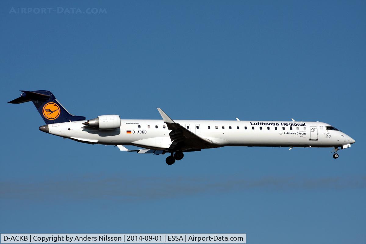 D-ACKB, 2006 Bombardier CRJ-900LR (CL-600-2D24) C/N 15073, On short final for runway 01R.