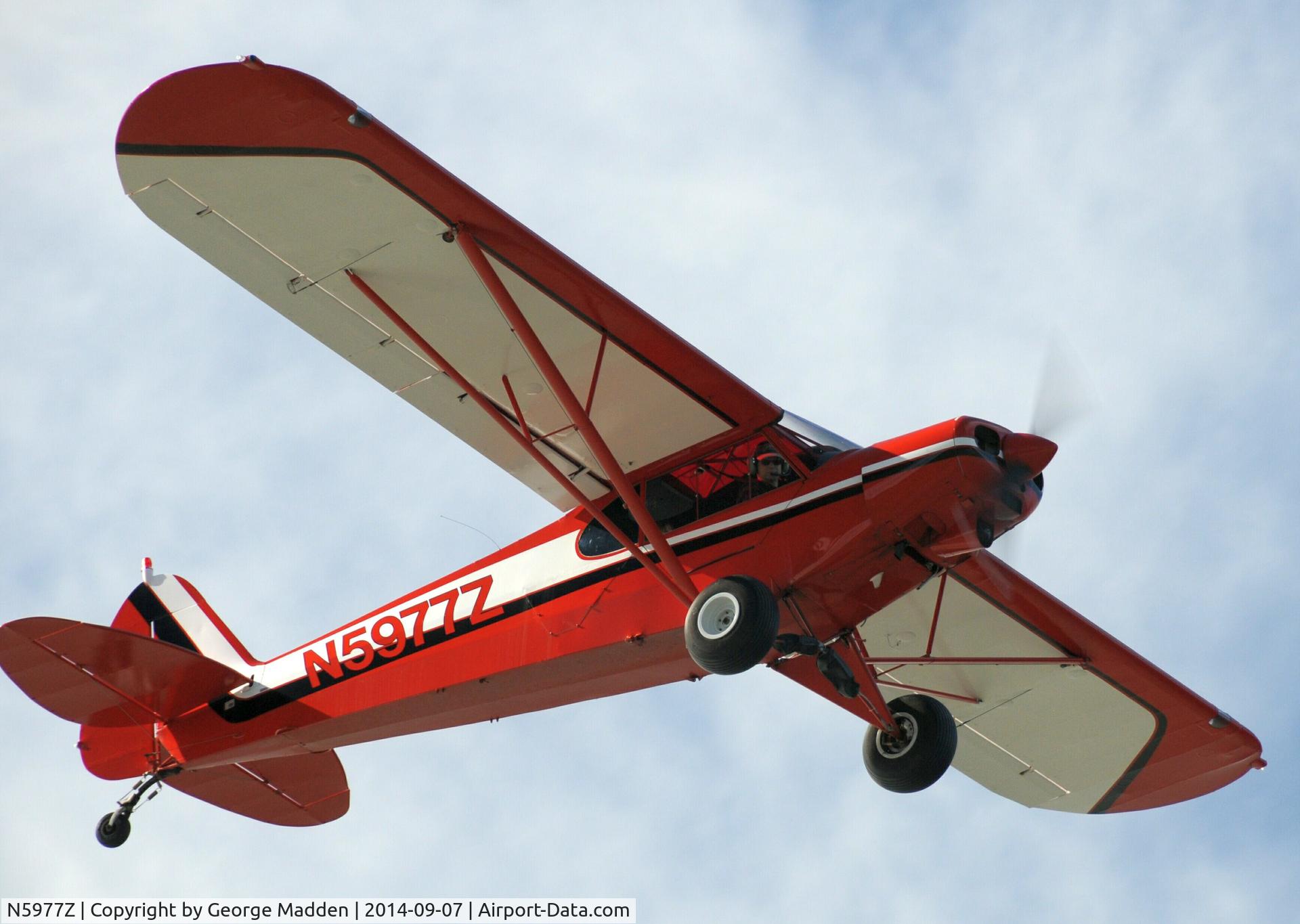 N5977Z, 1965 Piper PA-18-150 Super Cub C/N 18-8234, Flying along the coastline on the Kenai Peninsula.