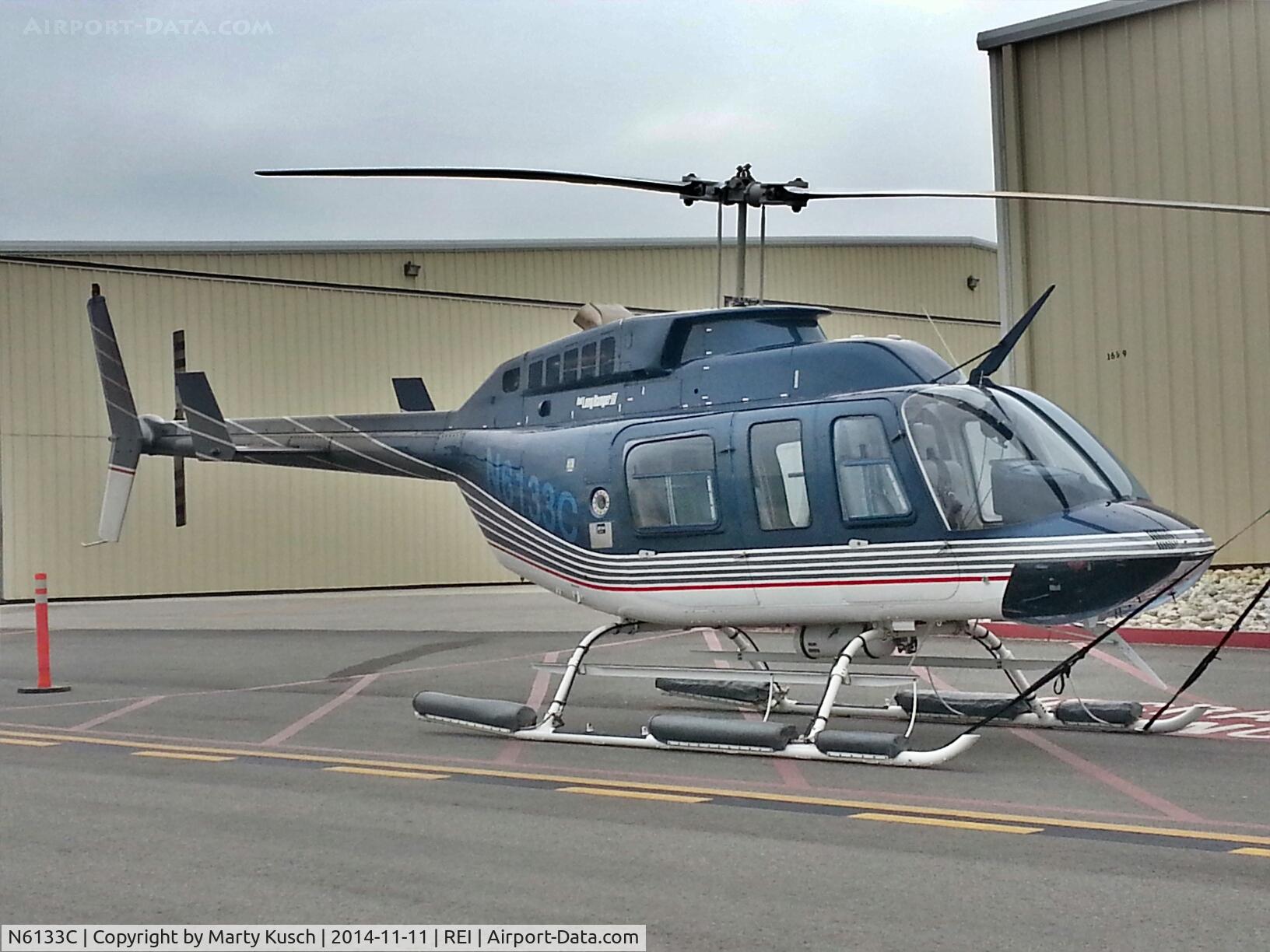 N6133C, 1991 Bell 206L-3 LongRanger III C/N 51544, Parked on ramp.