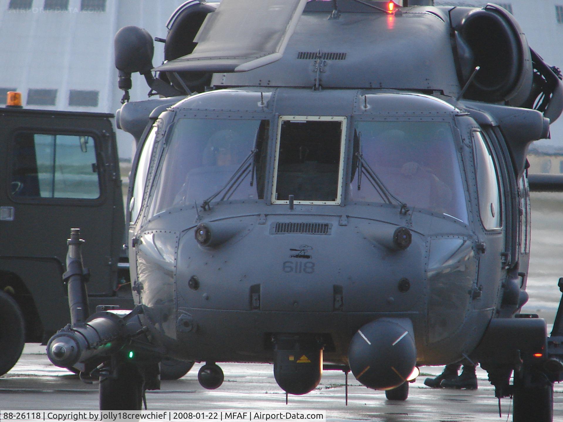 88-26118, 1988 Sikorsky HH-60G Pave Hawk C/N 70-1338, 18 being pushed into the hanger with crew onboard. Notice snoopy on the nose.