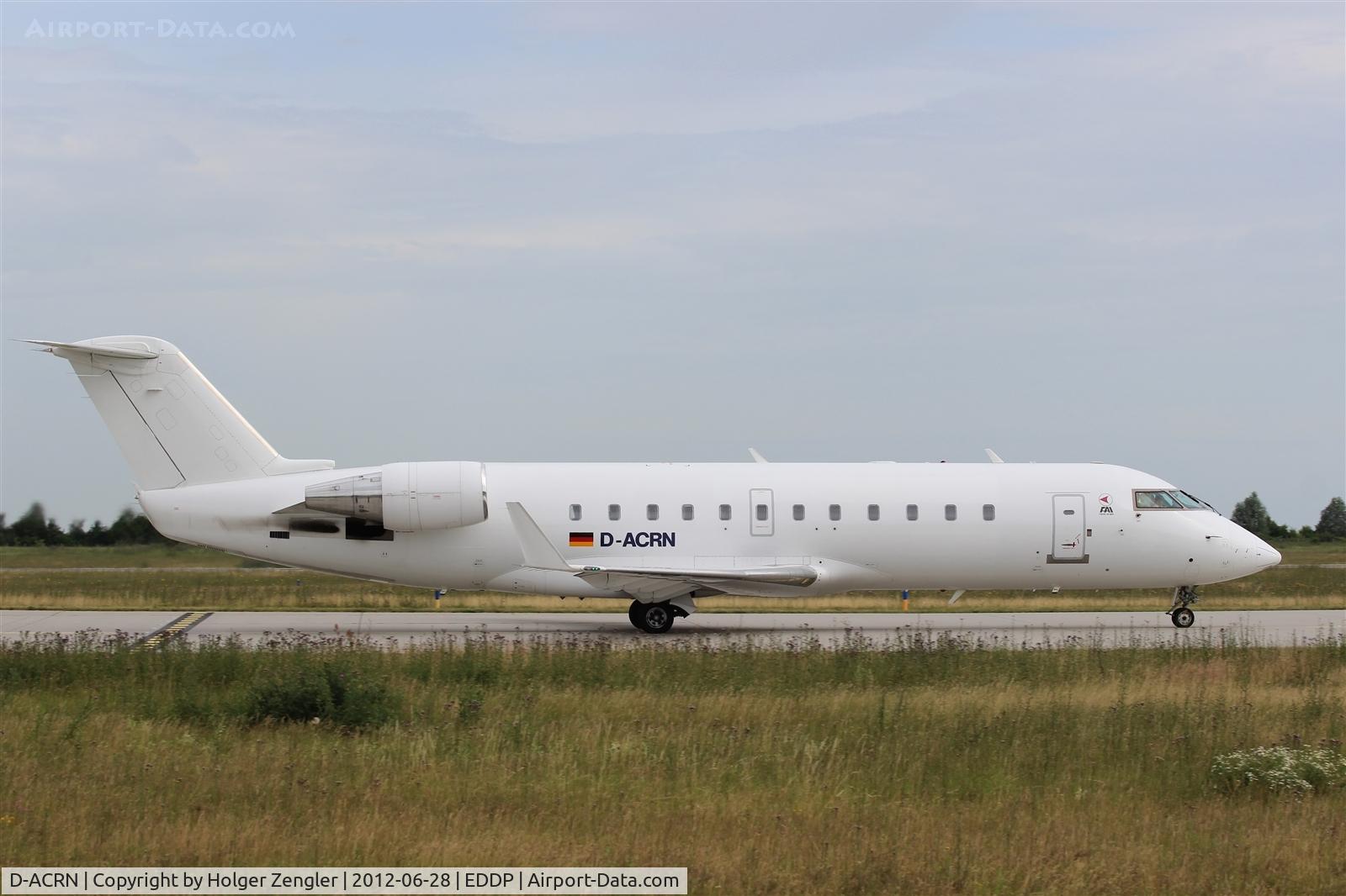 D-ACRN, 2001 Canadair CRJ-200LR (CL-600-2B19) C/N 7486, A white knight is passing by on twy C......