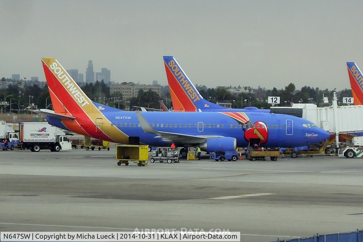 N647SW, 1997 Boeing 737-3H4 C/N 27717, The Triple Crown bird with a golden tail