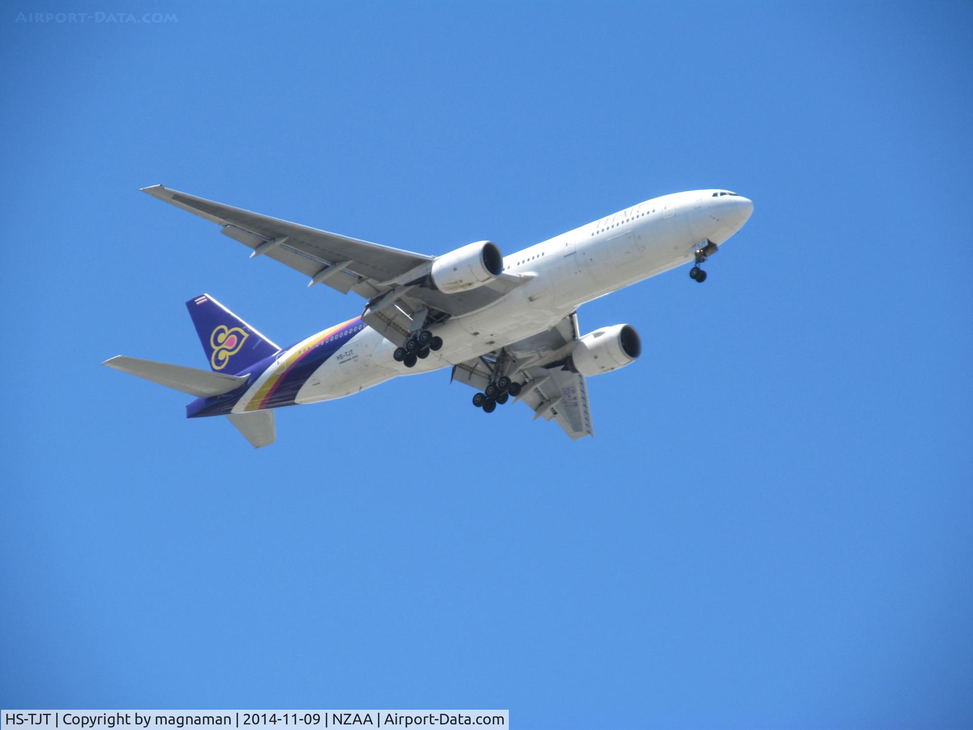 HS-TJT, 2006 Boeing 777-2D7/ER C/N 34588, On finals to AKL over flat bush