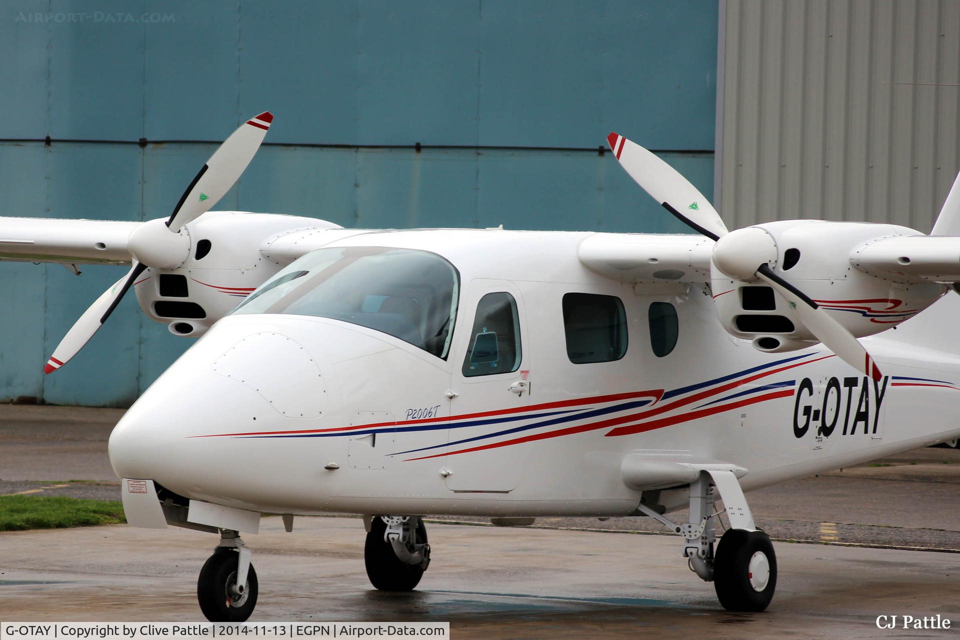 G-OTAY, 2010 Tecnam P-2006T C/N 049, A new acquisition for Tayside Aviation at Dundee EGPN seen at their base just after arrival. Presumably still to be painted in the Tayside scheme and used for multi-engine training to either supplement or replace the current G-JCLA.