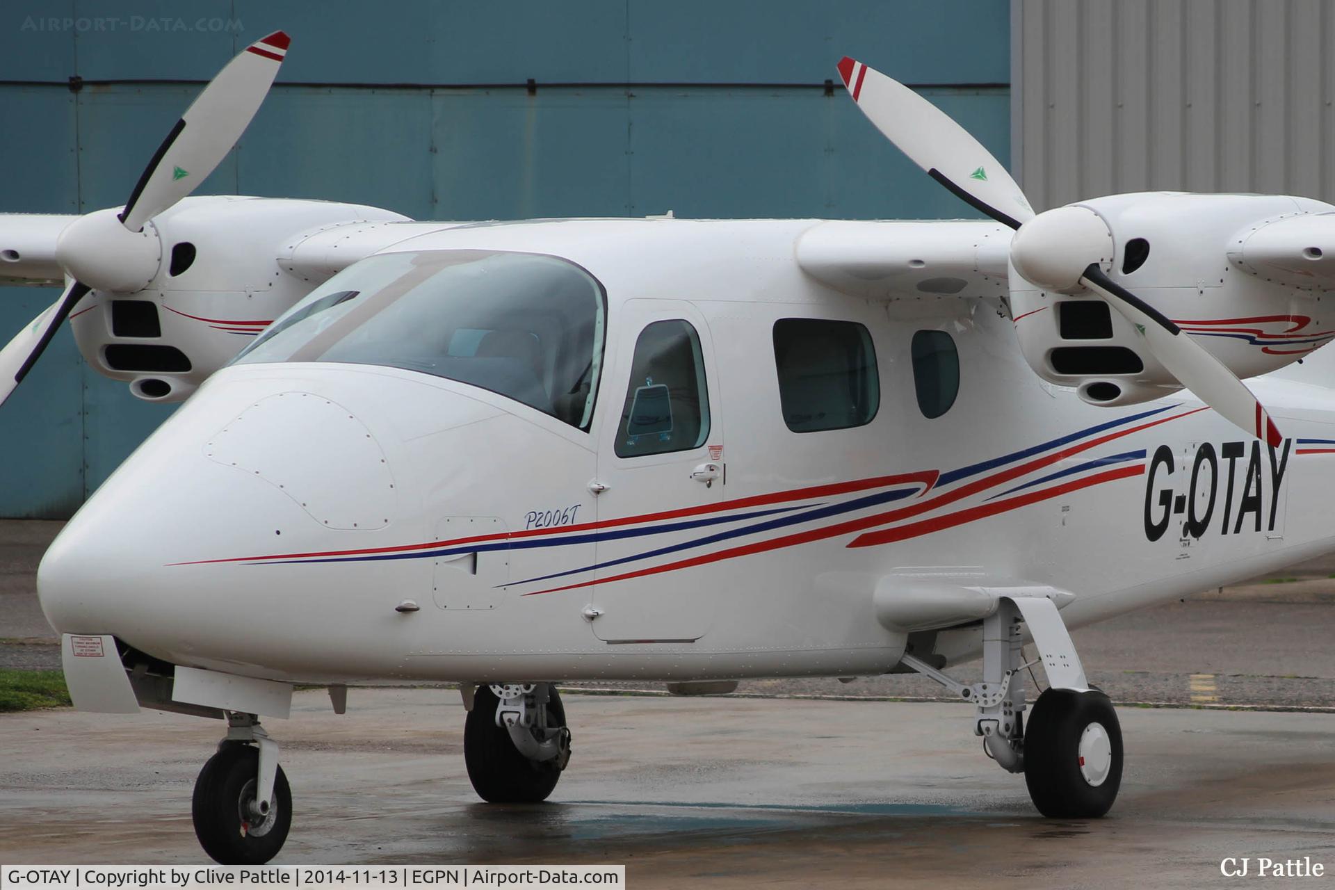 G-OTAY, 2010 Tecnam P-2006T C/N 049, A close-up view of a new acquisition for Tayside Aviation at Dundee EGPN seen at their base just after arrival. Presumably still to be painted in the Tayside scheme and used for multi-engine training to either supplement or replace the current G-JCLA.