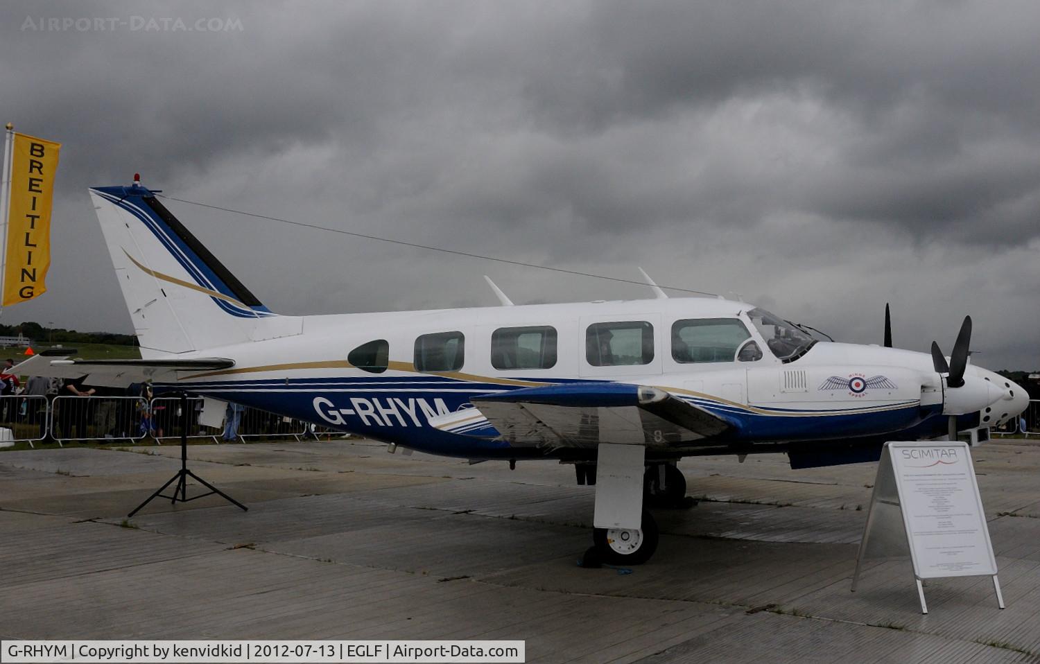 G-RHYM, 1972 Piper PA-31-310 Navajo C/N 31-815, On static display at FIA 2012.